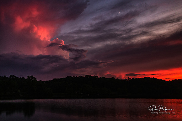 Colorful Sunset on Lake Logan with Crescent Moon and Thundercloud by Don Holycross of Hocking Hills Photography, Logan, Ohio
