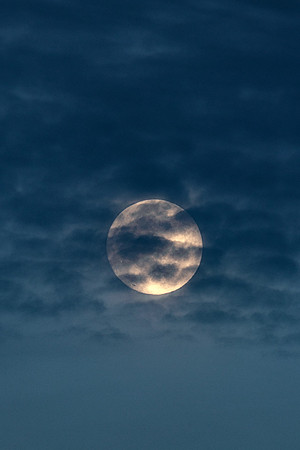 Wolf Full Moon Rising Through the Clouds Above Lake Logan by Don Holycross of Hocking Hills Photography, Logan, Ohio